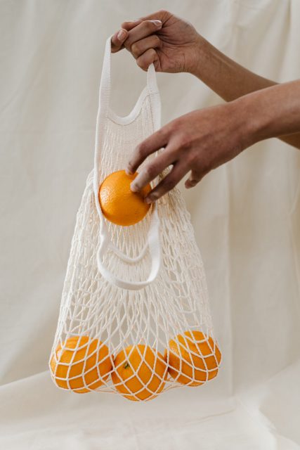 Oranges in ecological bag